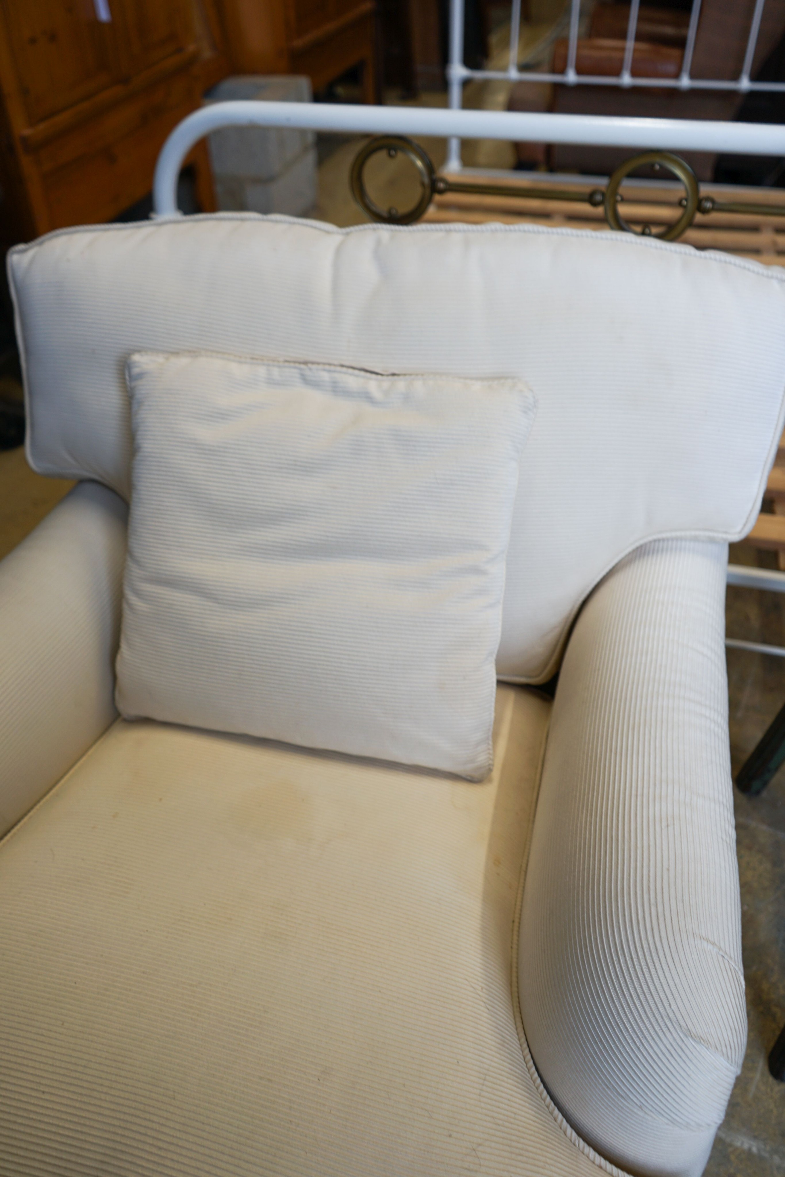 A Howard style upholstered armchair, width 84cm, depth 100cm, height 82cm